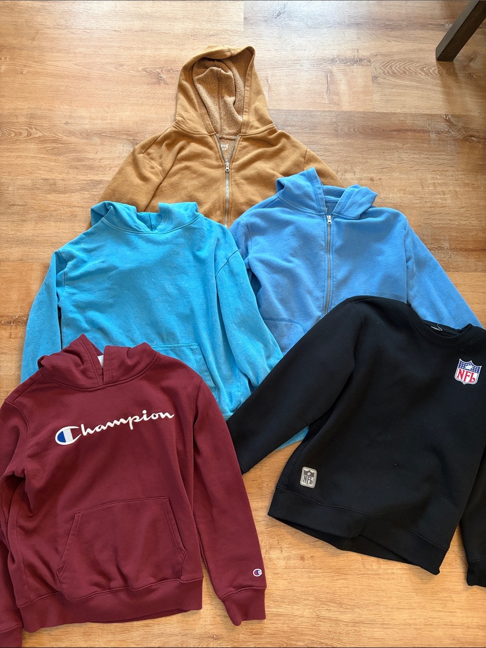 5 boys sweatshirts. Size M ( size 8). Cat and Jack/ NFL/ and champion